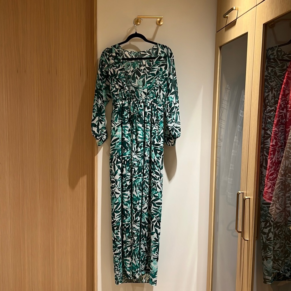 Sexy low cut bathing suit cover or dress. Bought at a boutique in Tulum